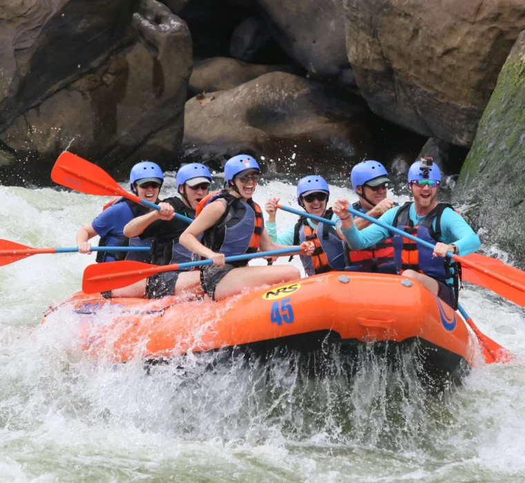 Pure adrenalin - a shared rafting adventure through splashing rapids in the midst of impressive nature.