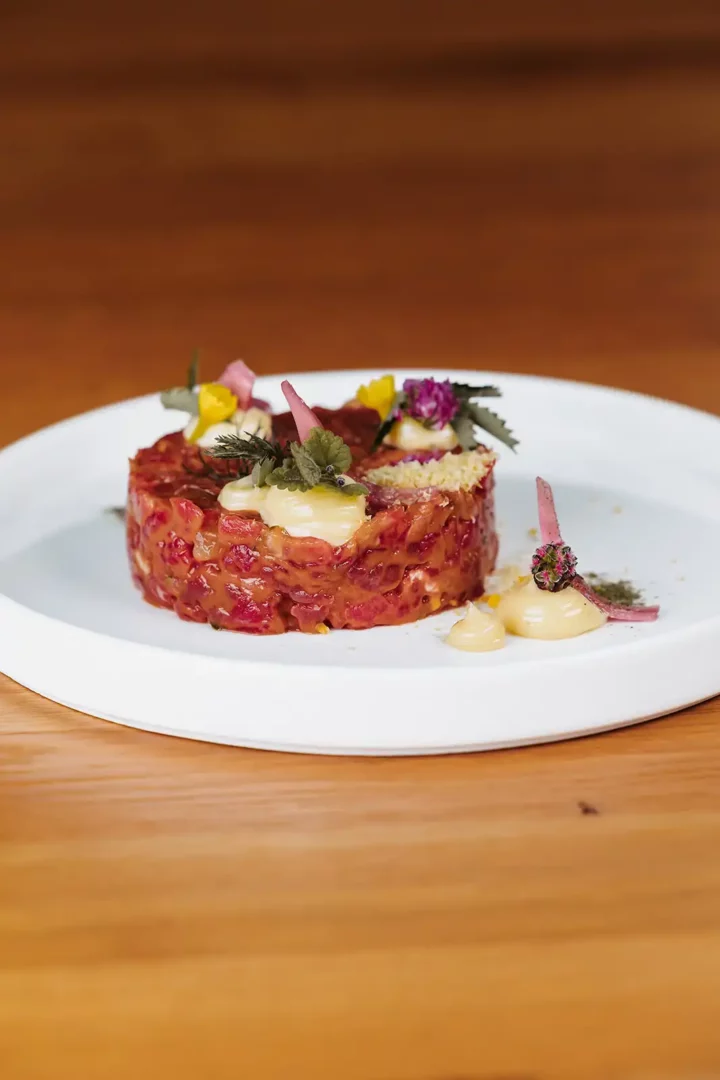 Beef tartare with aioli, onions and herbs.
