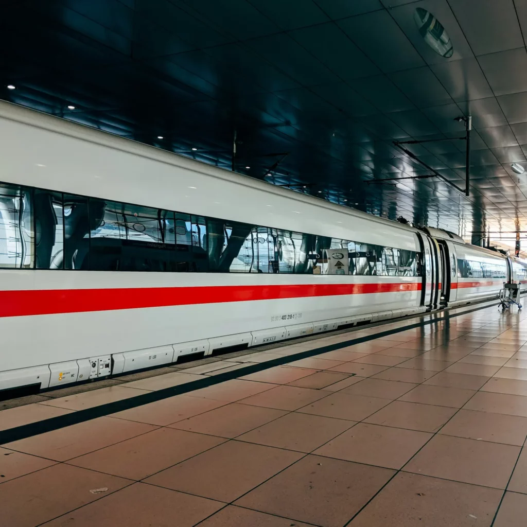 markus-winkler-dpmK-l9KPoY-unsplash Modern ICE train on the platform - climate-friendly travelling by train